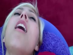 A slim, amateur blonde in a hot pussy-toying solo scene